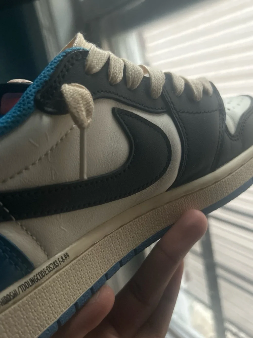 Nike Low-Top Sneakers in White, Black, Blue & Cream